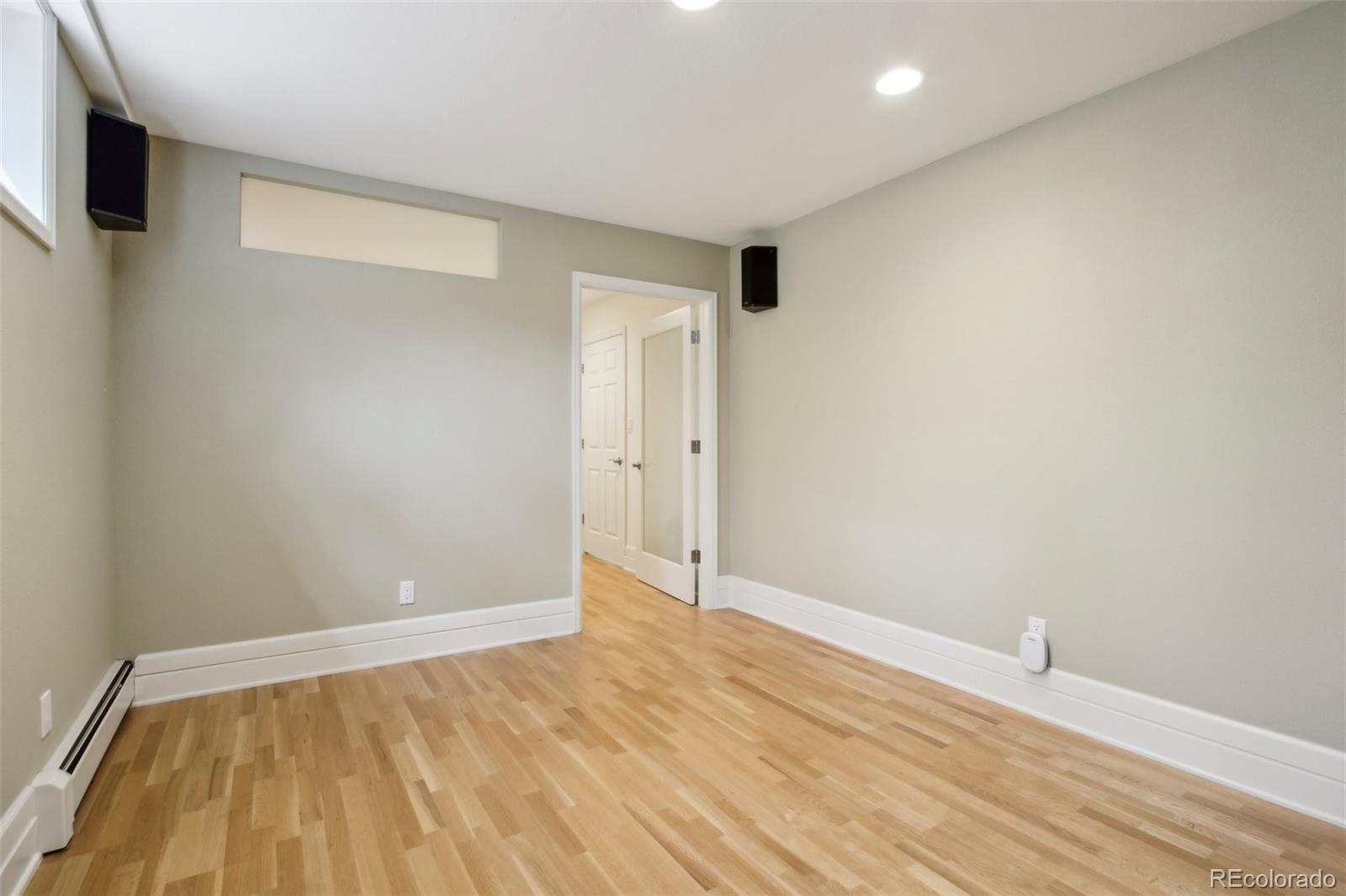 2255 18th Street Boulder, CO 80302 - Photo 25 of 45 a view of an empty room with wooden floor