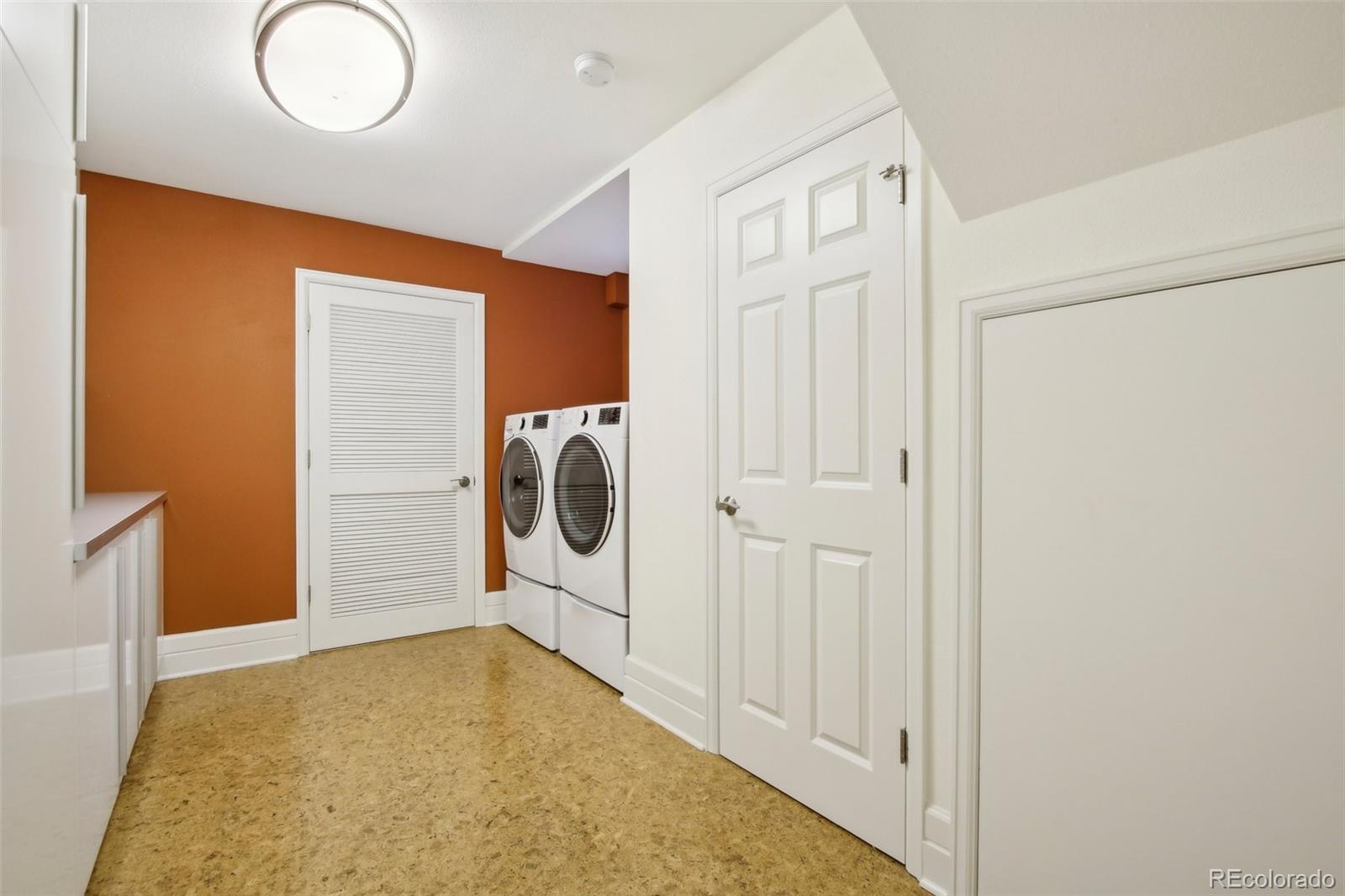 2255 18th Street Boulder, CO 80302 - Photo 27 of 45 a view of a storage & utility room with a washer dryer
