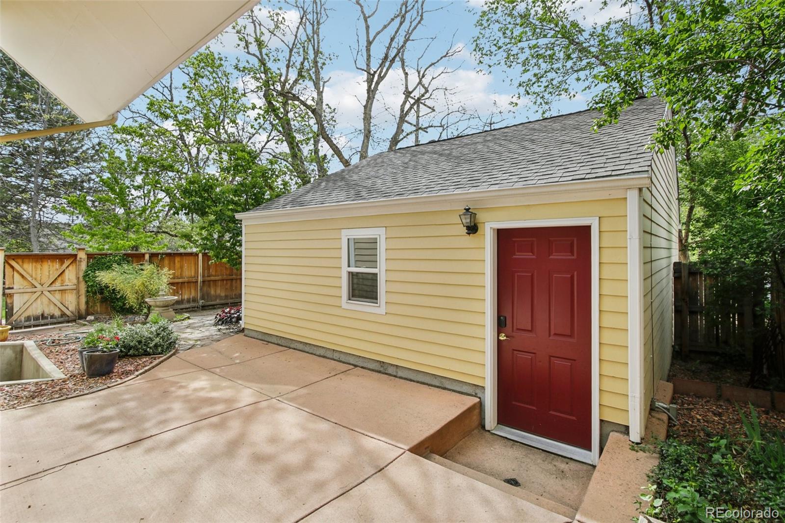 2255 18th Street Boulder, CO 80302 - Photo 32 of 45 a view of a house with a backyard