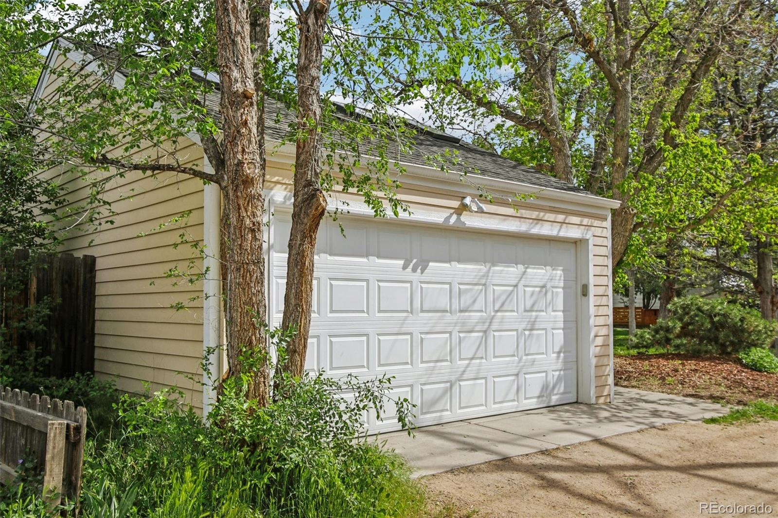 2255 18th Street Boulder, CO 80302 - Photo 33 of 45 a front view of a house with a tree