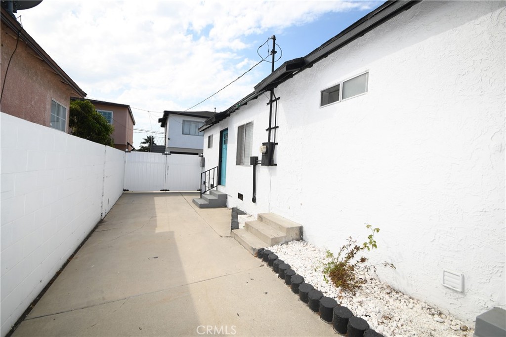4028 160th Street Lawndale, CA 90260 - Photo 13 of 26 a view of a house with a yard