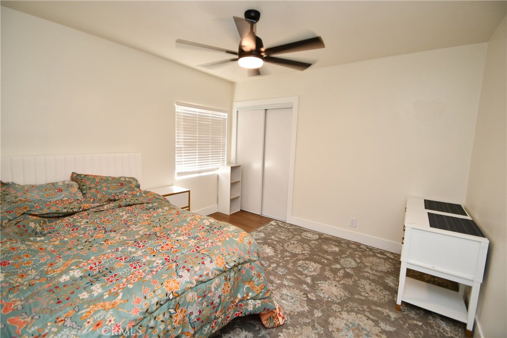 4028 160th Street Lawndale, CA 90260 - Photo 17 of 26 a bedroom with a bed and a window