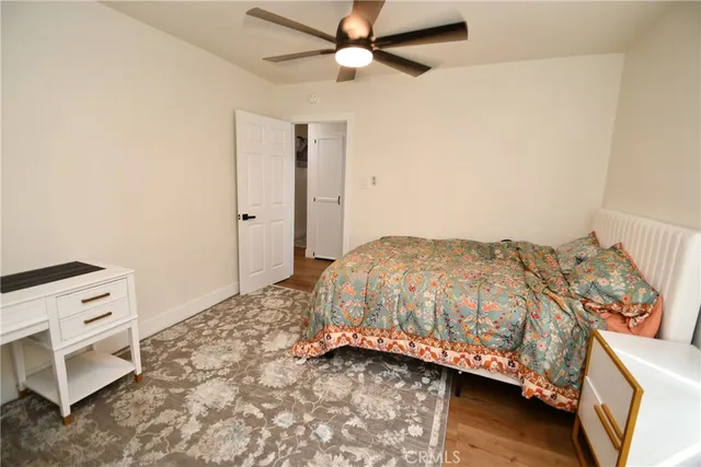 a bedroom with a bed and a cabinets