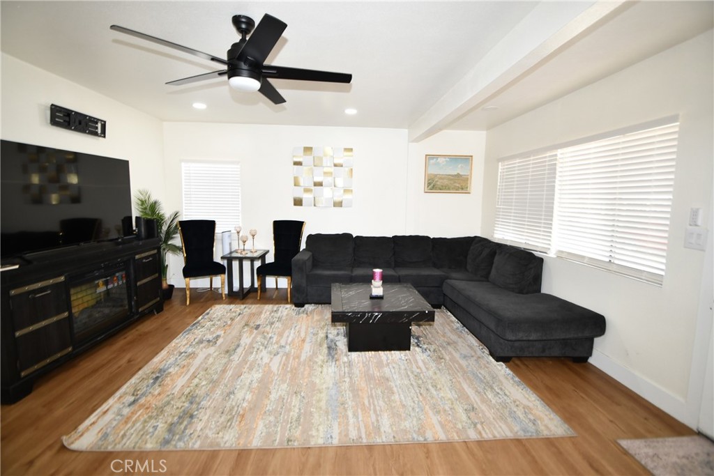 4028 160th Street Lawndale, CA 90260 - Photo 2 of 26 a living room with furniture and a flat screen tv