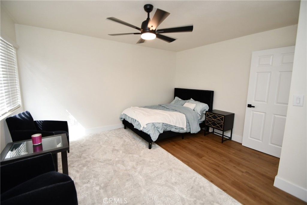 4028 160th Street Lawndale, CA 90260 - Photo 8 of 26 a bedroom with a bed and a couch