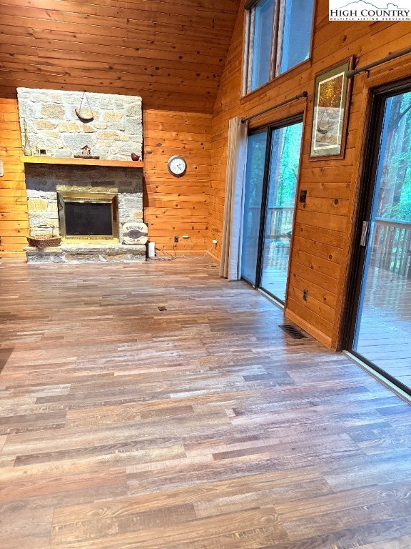 154 Breezy Lane Deep Gap, NC 28618 - Photo 11 of 46 a view of a livingroom with wooden floor and fireplace