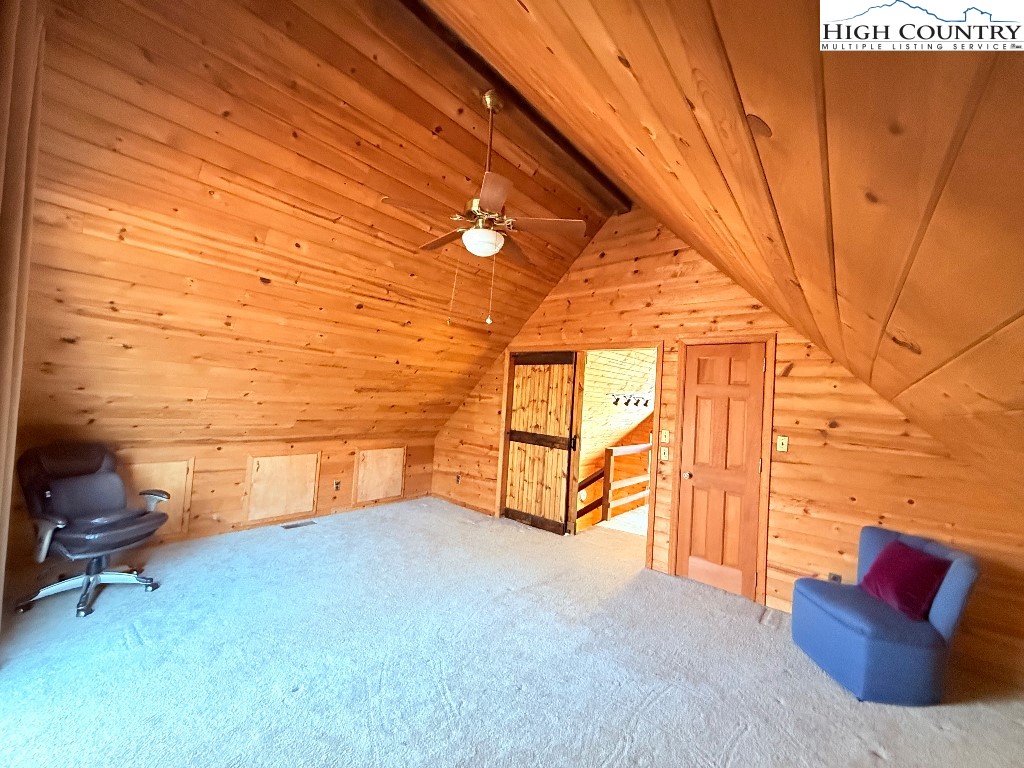 154 Breezy Lane Deep Gap, NC 28618 - Photo 18 of 46 a view of a couch in a room