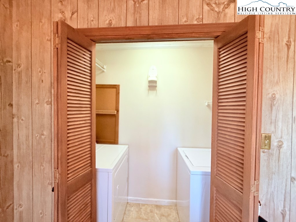 154 Breezy Lane Deep Gap, NC 28618 - Photo 30 of 46 a view of a wooden door and a window