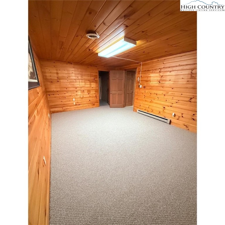 154 Breezy Lane Deep Gap, NC 28618 - Photo 36 of 46 a view of an empty room with a window