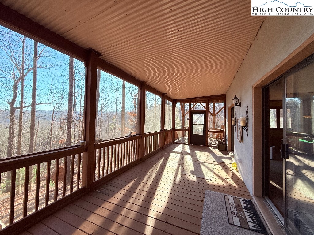 154 Breezy Lane Deep Gap, NC 28618 - Photo 39 of 46 a view of balcony with a large window