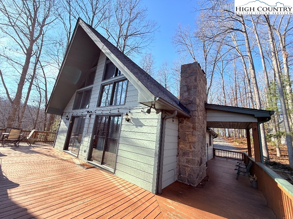 154 Breezy Lane Deep Gap, NC 28618 - Photo 4 of 46 a view of a house with wooden stairs