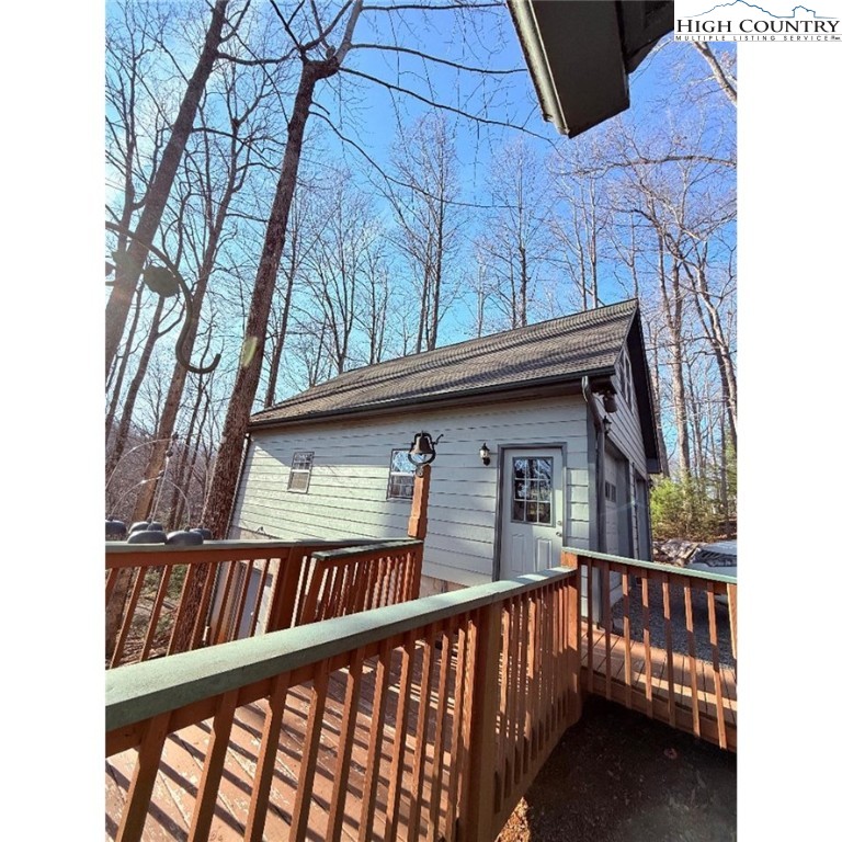 154 Breezy Lane Deep Gap, NC 28618 - Photo 45 of 46 a view of balcony with lots of trees