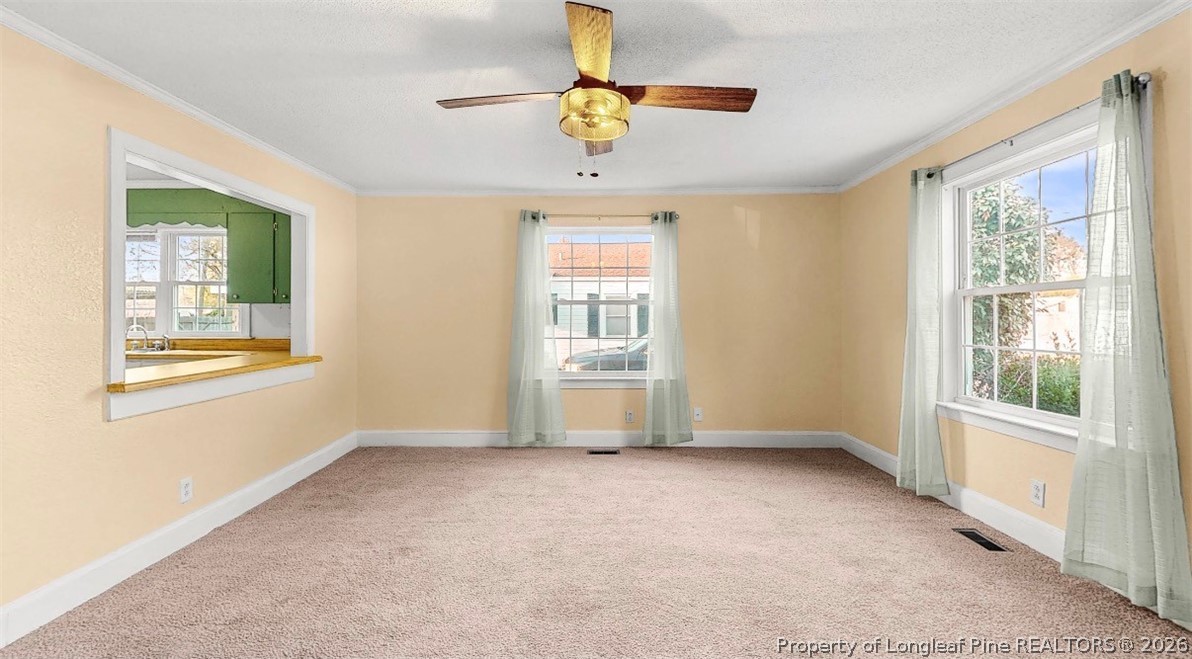 106 County Avenue Dunn, NC 28334 - Photo 13 of 24 a view of an empty room with a window