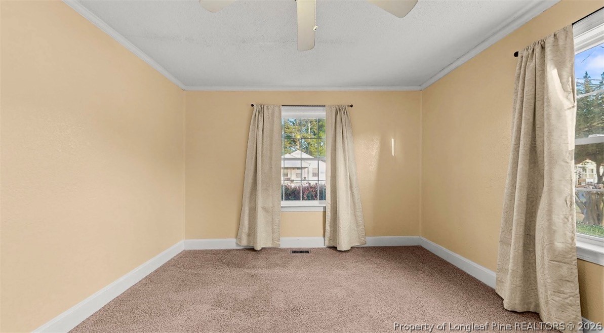 106 County Avenue Dunn, NC 28334 - Photo 18 of 24 an empty room with window