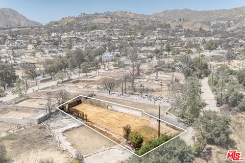 a view of a swimming pool with a mountain