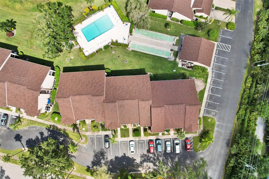 6221 Timberlake Drive, Unit C10 Sarasota, FL 34243 - Photo 2 of 27 an outdoor space with furniture and garden