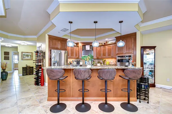 a kitchen with a table and chairs in it