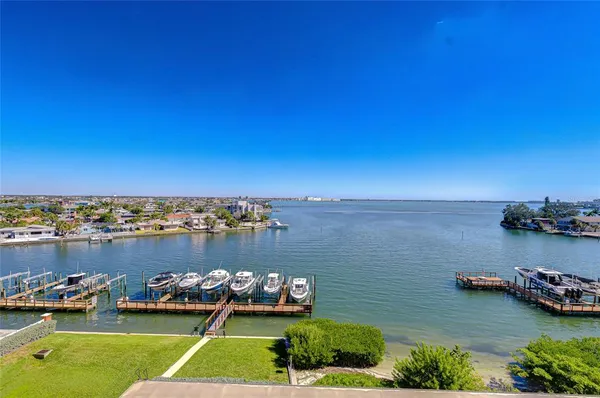 a view of a lake with houses with outdoor space