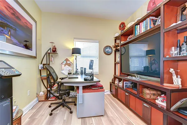 a view of a room with chairs and toys