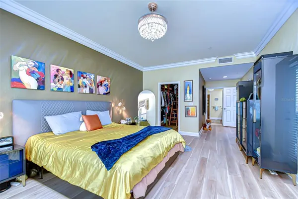 a bathroom with a sink a mirror and a shower