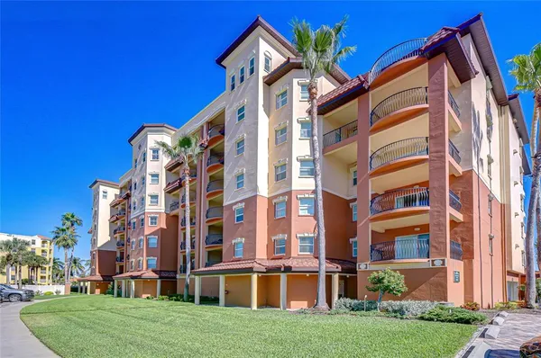 front view of building with a yard