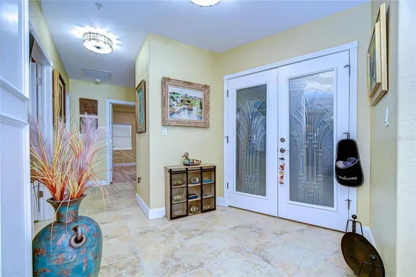 a view of an entryway with wooden floor