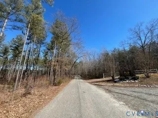 a view of a road with a yard