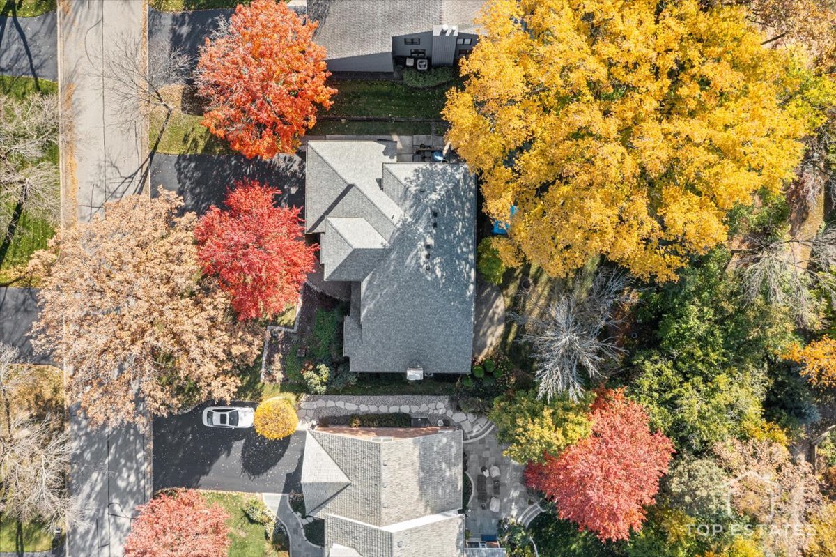 7612 Ridgewood Lane Burr Ridge, IL 60527 - Photo 30 of 36 an aerial view of a house with a yard
