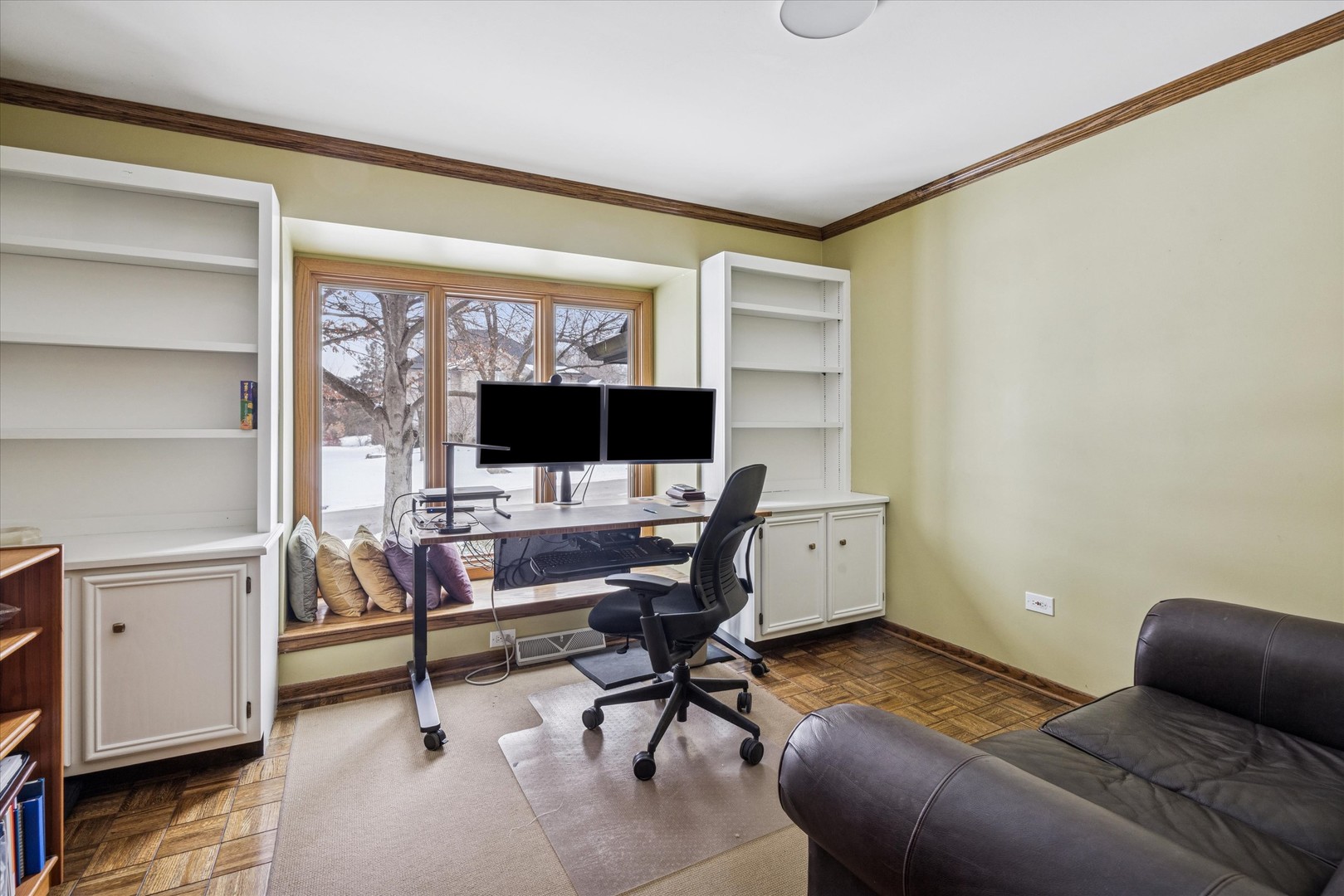 7612 Ridgewood Lane Burr Ridge, IL 60527 - Photo 9 of 36 a view of a livingroom with workspace and a window