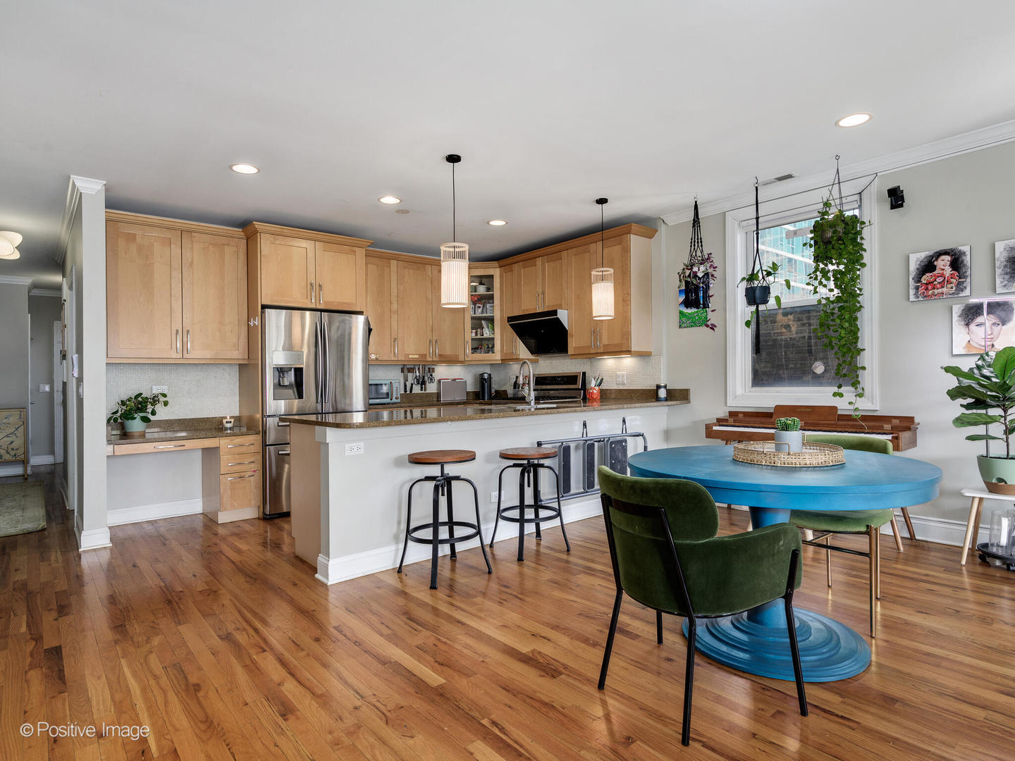 830 West Bradley Place, Unit 3S Chicago, IL 60613 - Photo 9 of 22 a view of kitchen with cabinets table and chairs