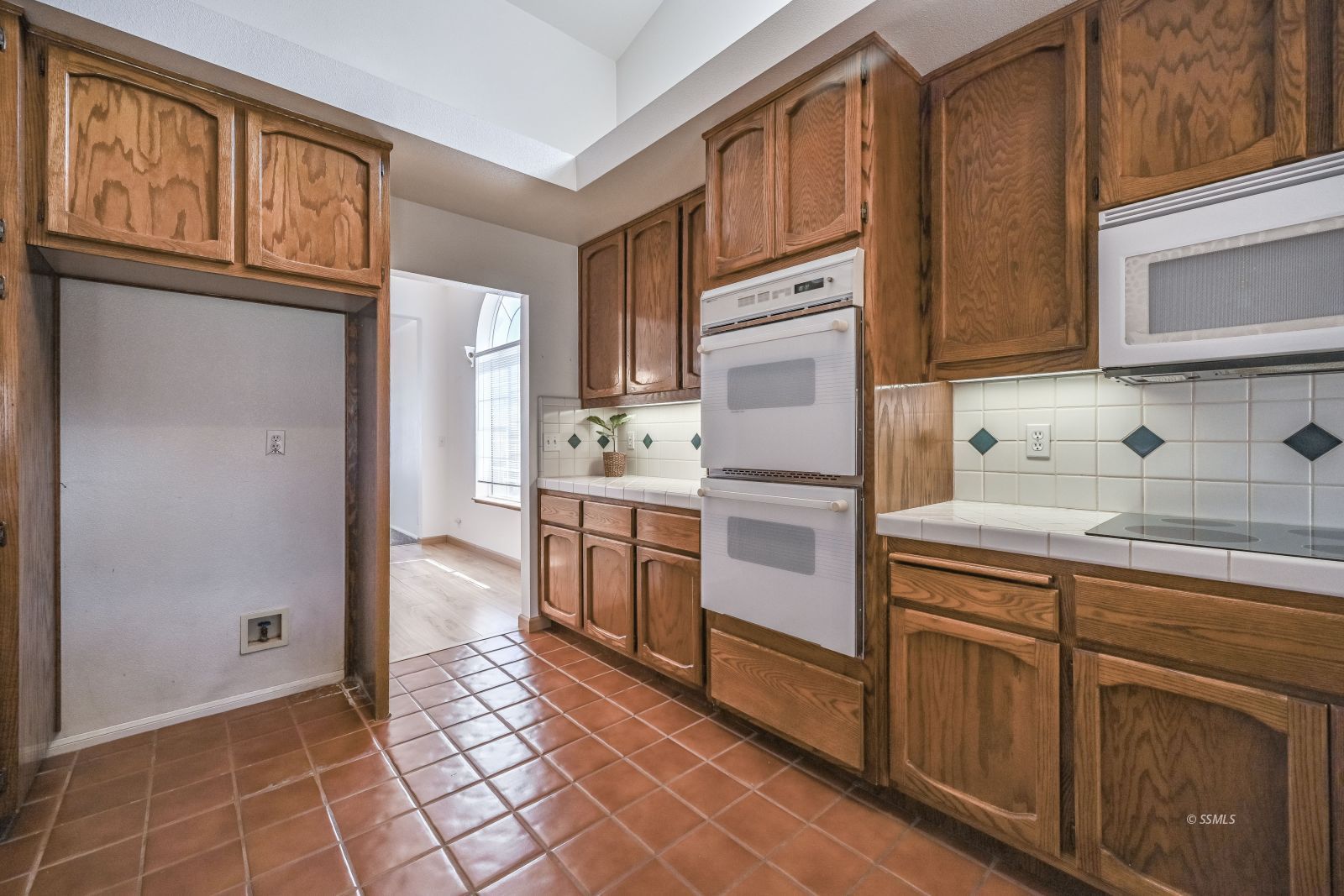1209 West Robert Avenue Ridgecrest, CA 93555 - Photo 8 of 50 a kitchen with appliances cabinets and a sink