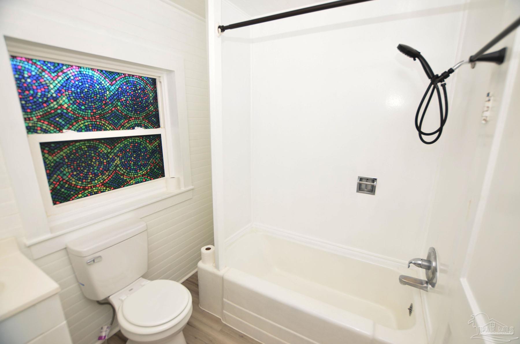 6475 Chestnut Road Molino, FL 32577 - Photo 28 of 67 a bathroom with a toilet and a shower