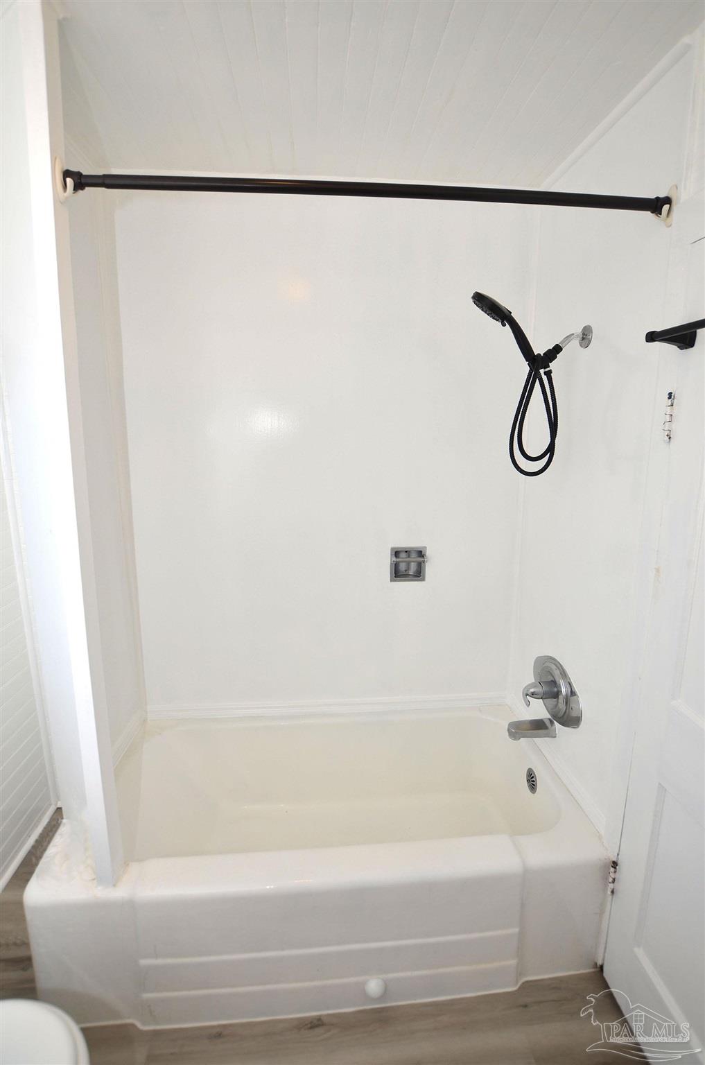 6475 Chestnut Road Molino, FL 32577 - Photo 30 of 67 a bathroom with a bathtub and a shower