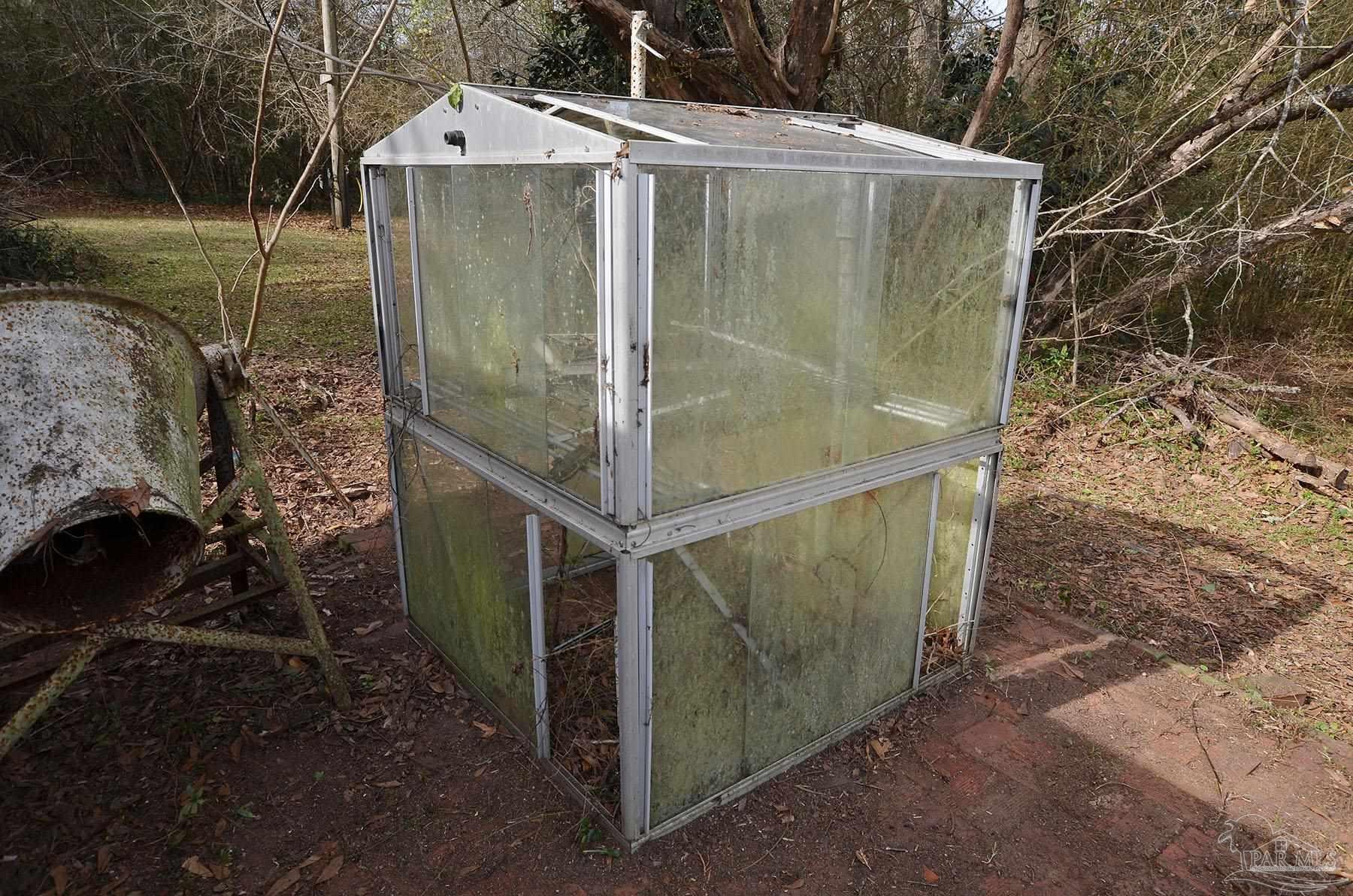 6475 Chestnut Road Molino, FL 32577 - Photo 59 of 67 a aerial view of a house with a yard