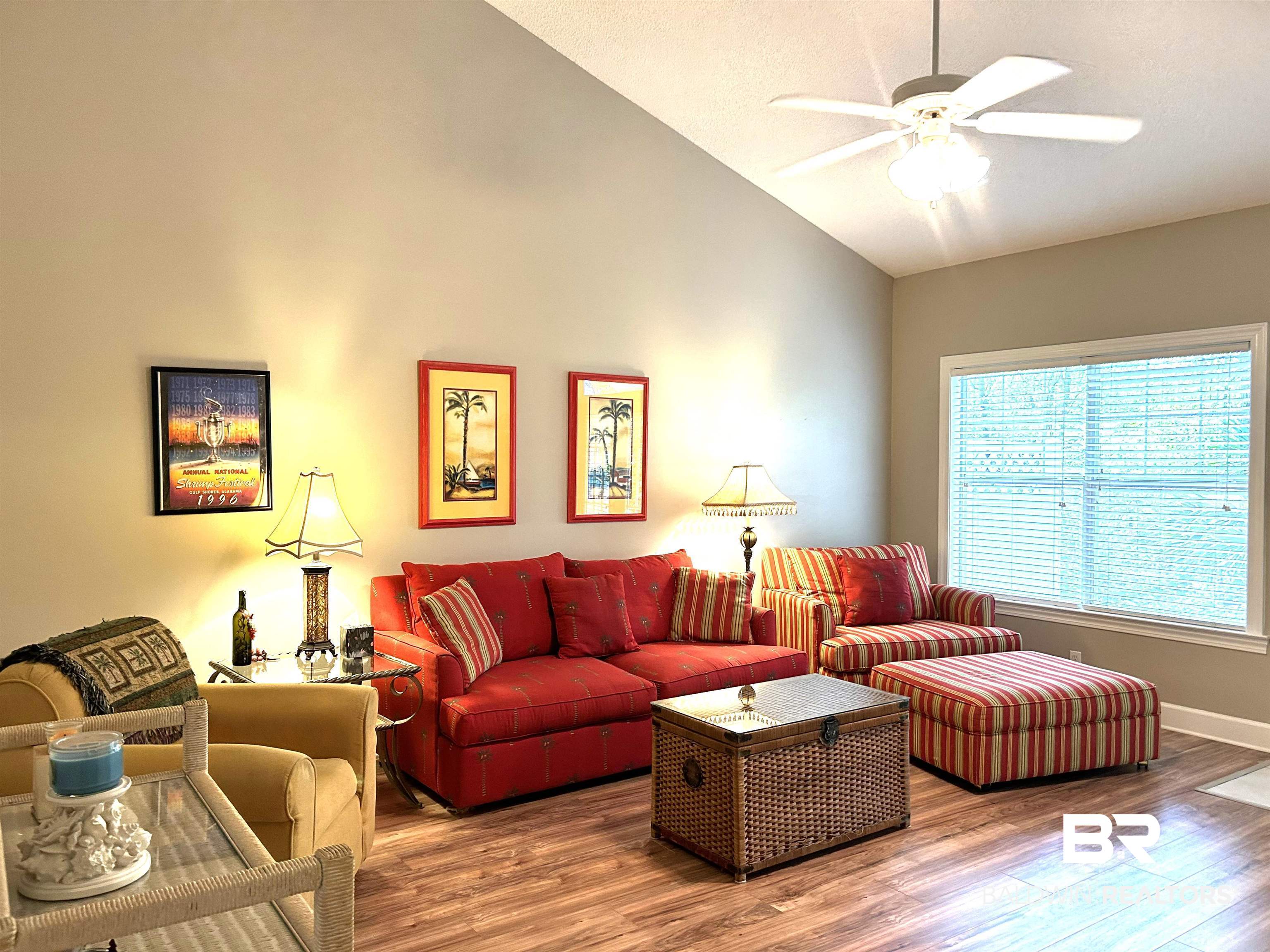 430 West Fort Morgan Road, Unit 404 Gulf Shores, AL 36542 - Photo 7 of 31 Living room featuring high vaulted ceiling, ceiling fan, and wood-type flooring