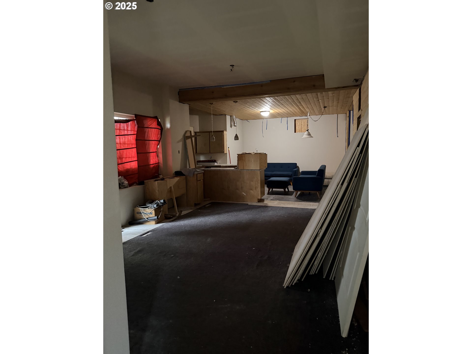 154 Shipview Road Kalama, WA 98625 - Photo 16 of 22 a living room with furniture and a flat screen tv