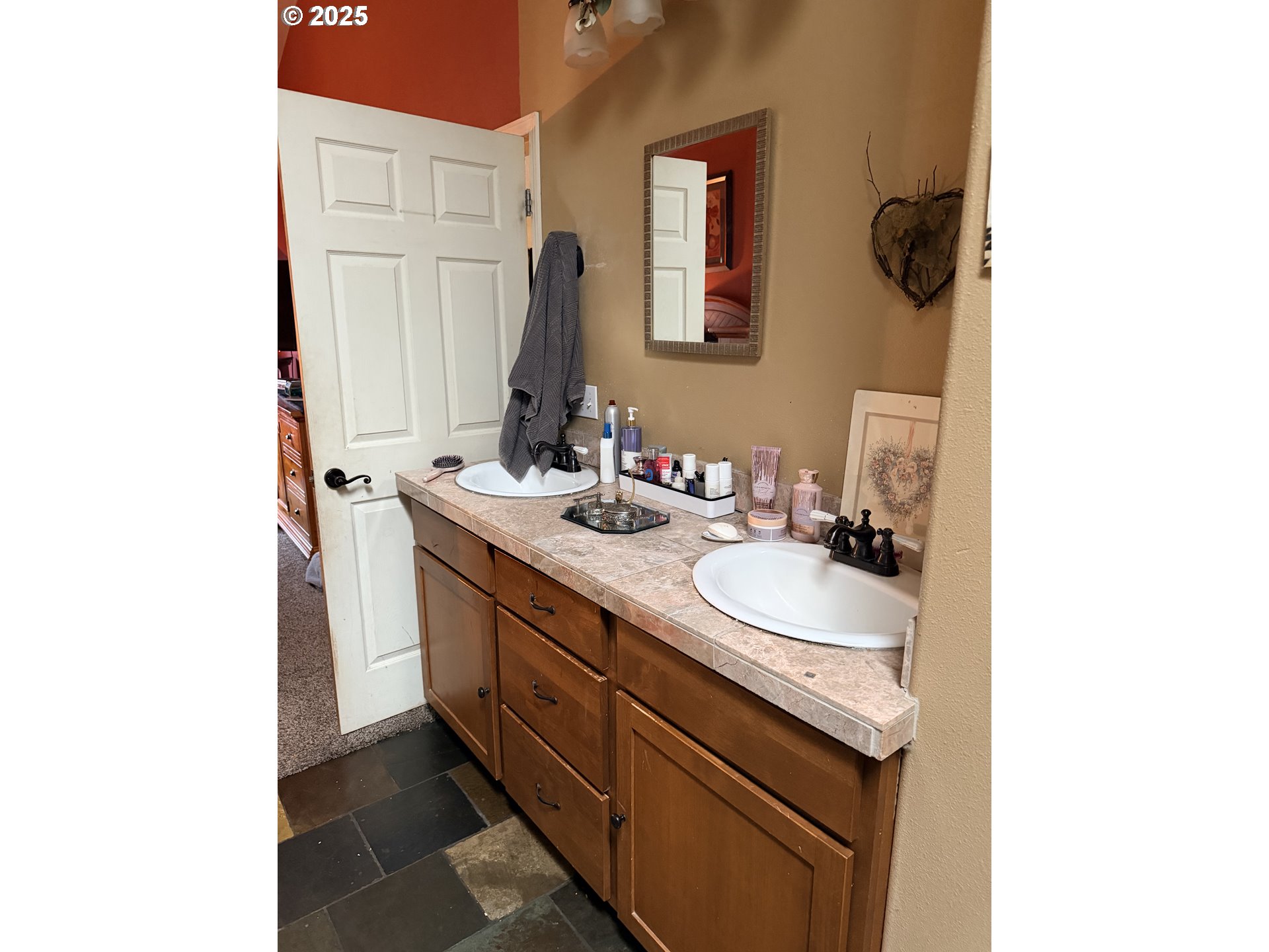 154 Shipview Road Kalama, WA 98625 - Photo 22 of 22 a bathroom with a sink and a mirror