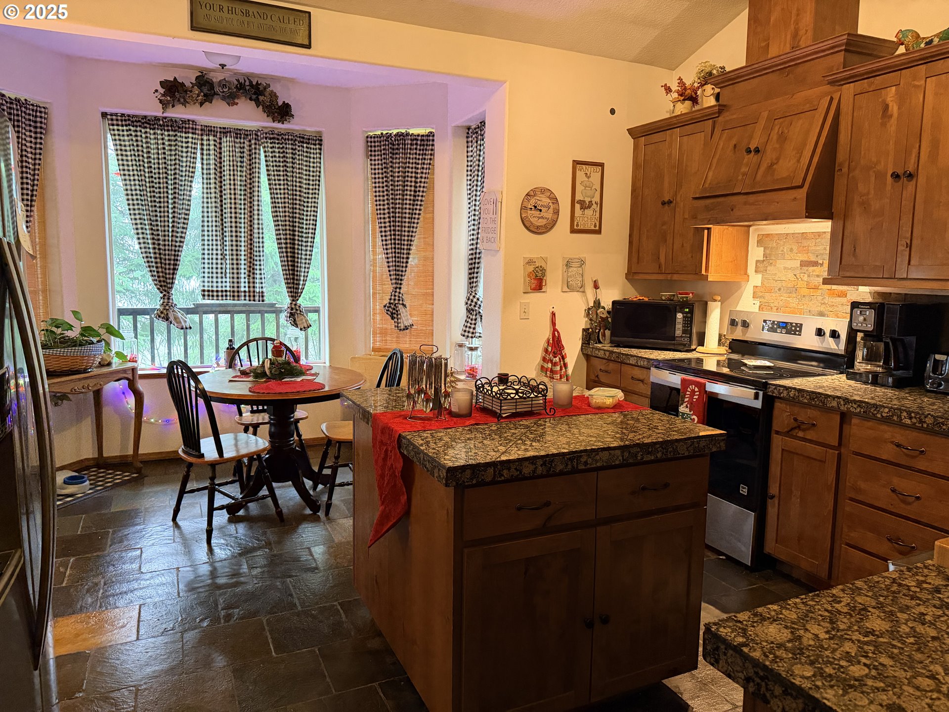 154 Shipview Road Kalama, WA 98625 - Photo 3 of 22 a view of a dining room with furniture window and outside view