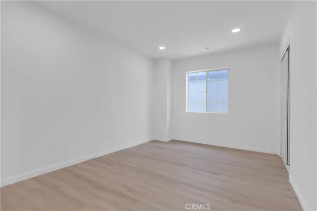 a kitchen with cabinets appliances and a sink