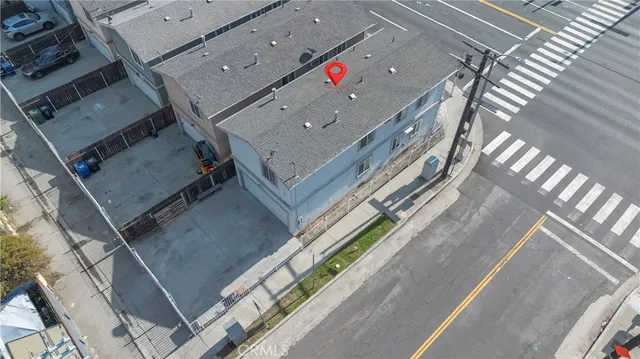 a front view of a house with large windows