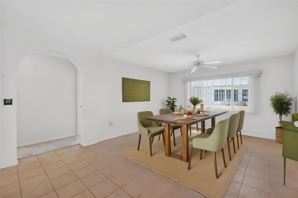 8739 Southeast 140th Place Road Summerfield, FL 34491 - Photo 13 of 45 a view of a dining room with furniture