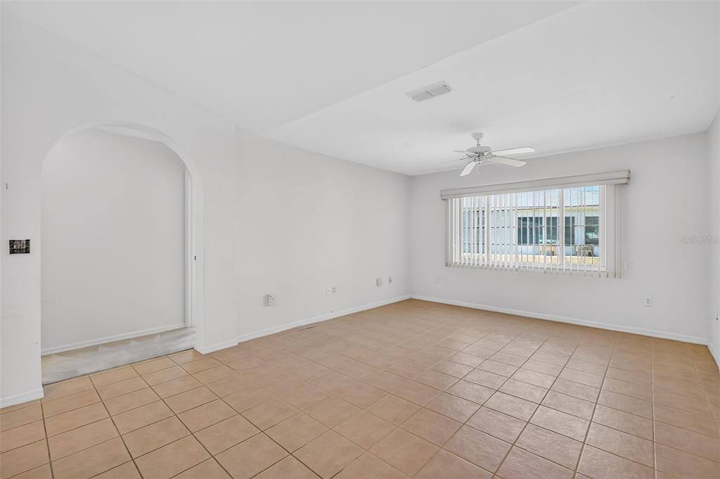 8739 Southeast 140th Place Road Summerfield, FL 34491 - Photo 14 of 45 an empty room with windows