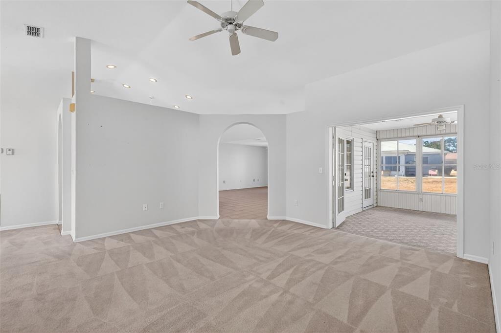 8739 Southeast 140th Place Road Summerfield, FL 34491 - Photo 18 of 45 a view of an empty room with a window