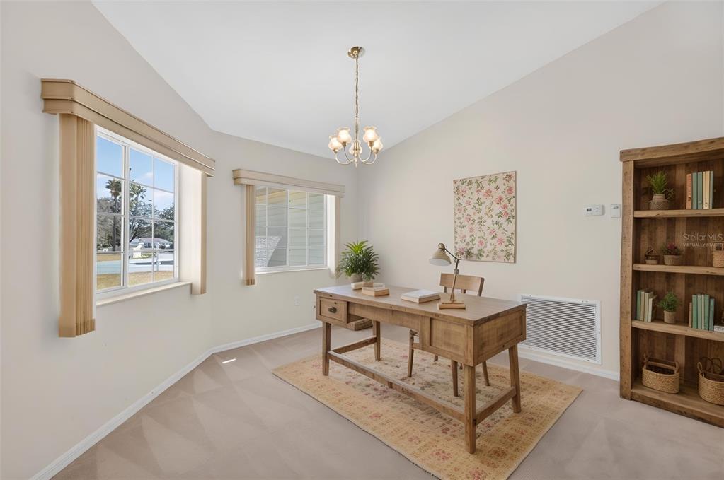 8739 Southeast 140th Place Road Summerfield, FL 34491 - Photo 20 of 45 a workspace with furniture and window