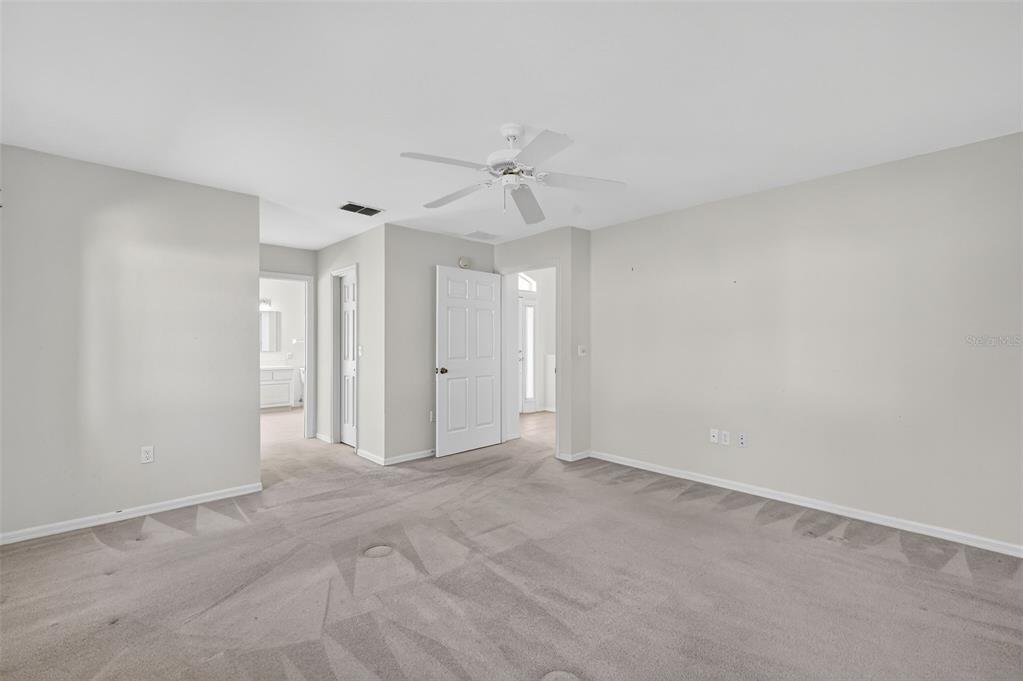 8739 Southeast 140th Place Road Summerfield, FL 34491 - Photo 24 of 45 wooden floor in an empty room