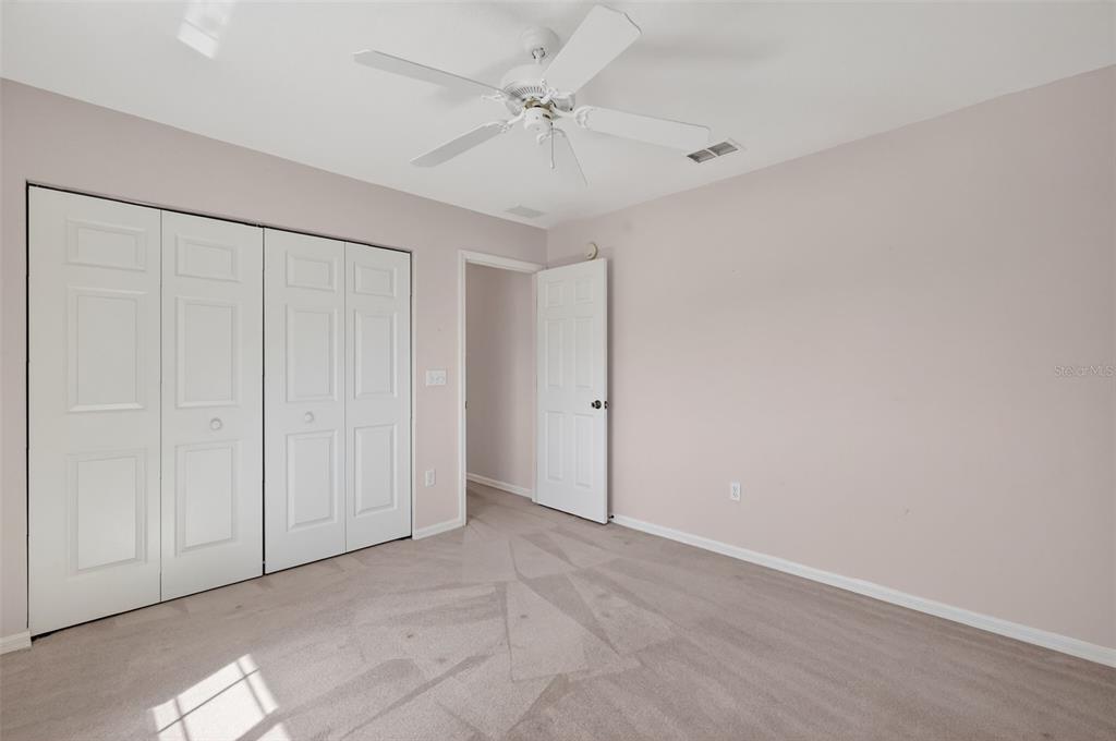 8739 Southeast 140th Place Road Summerfield, FL 34491 - Photo 31 of 45 a view of an empty room