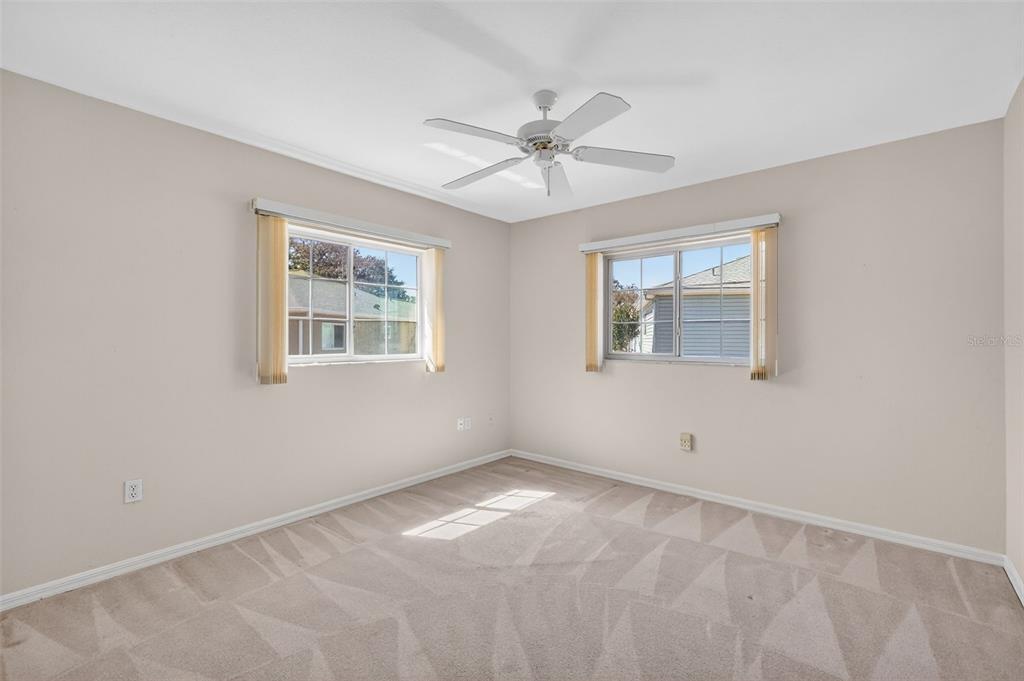 8739 Southeast 140th Place Road Summerfield, FL 34491 - Photo 34 of 45 a view of an empty room with a window