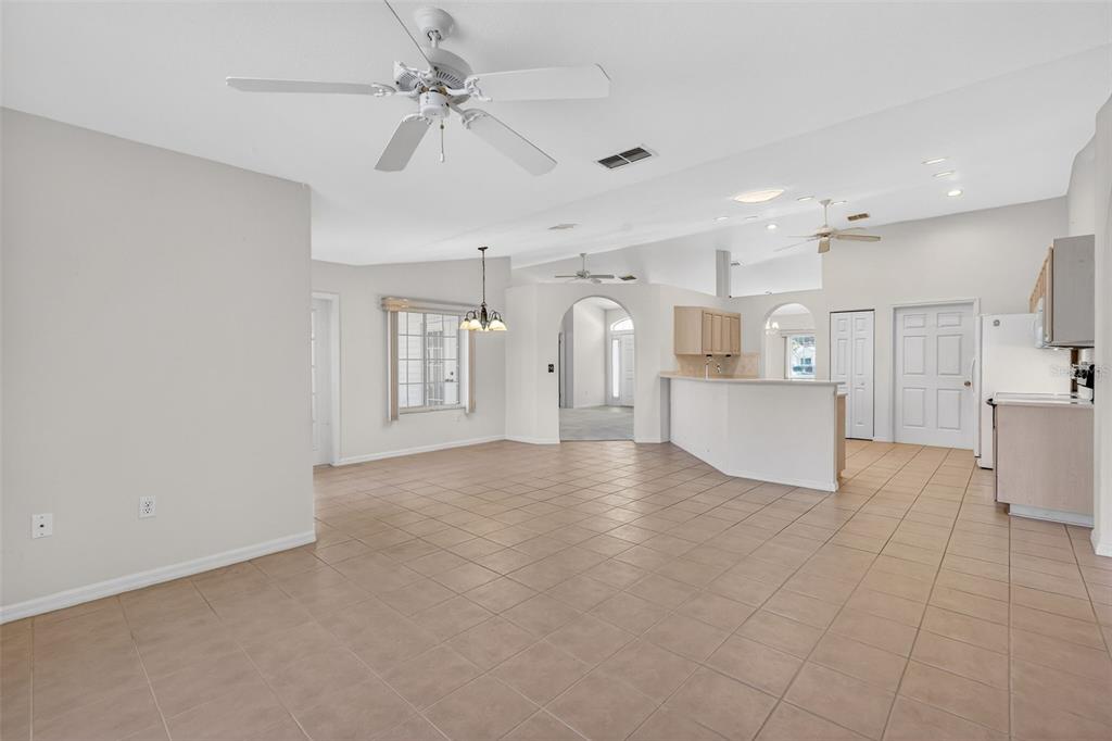 8739 Southeast 140th Place Road Summerfield, FL 34491 - Photo 8 of 45 a view of a kitchen with furniture and a kitchen