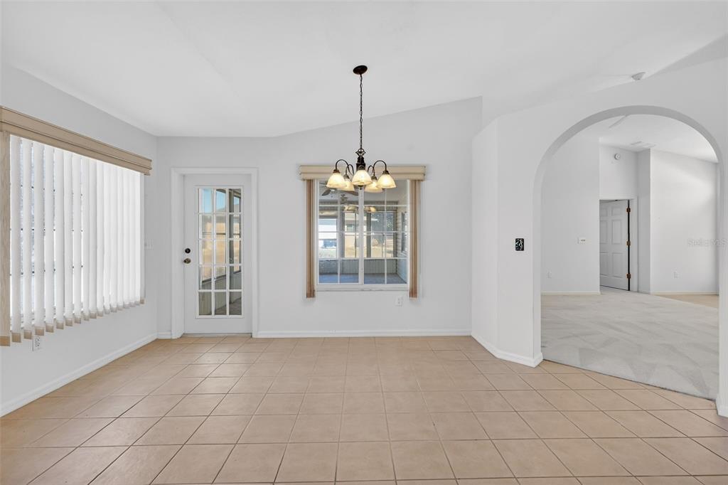 8739 Southeast 140th Place Road Summerfield, FL 34491 - Photo 10 of 45 a view of an empty room with window