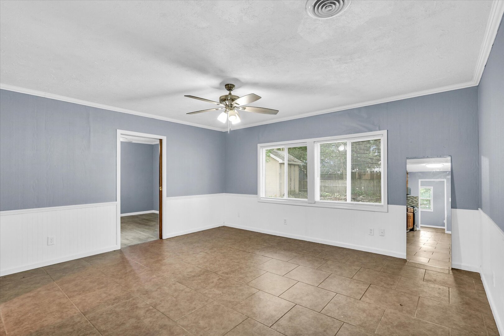 817 Roselyn Drive Rantoul, IL 61866 - Photo 12 of 33 a view of an empty room with a window